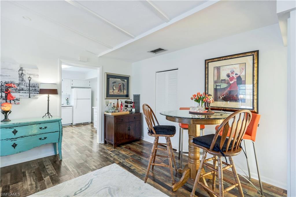 1382 Jamaica Road Marco Island, FL 34145 - Photo 8 of 27 a view of a dining room with furniture