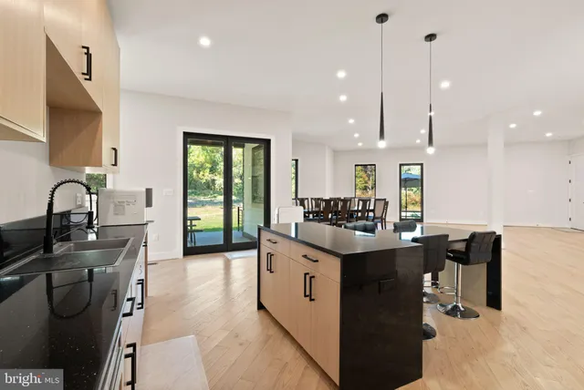 a view of an empty room and a window