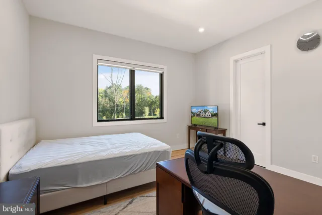 a bathroom with a shower and a toilet