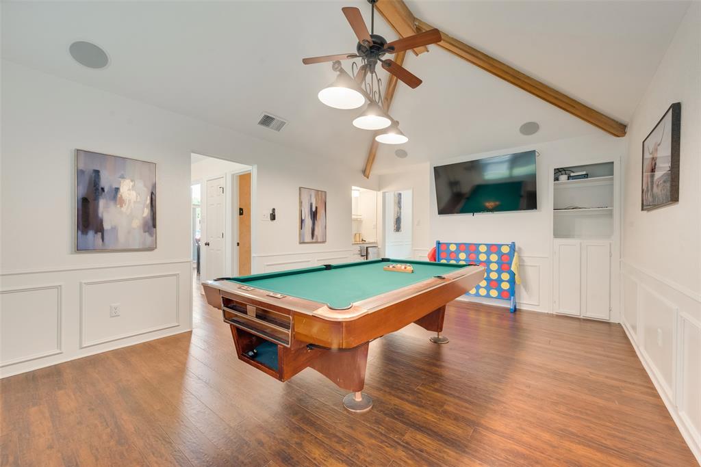 4027 Red Maple Drive Carrollton, TX 75007 - Photo 28 of 35 a room with furniture and flat screen tv