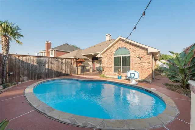 a view of a house with a swimming pool
