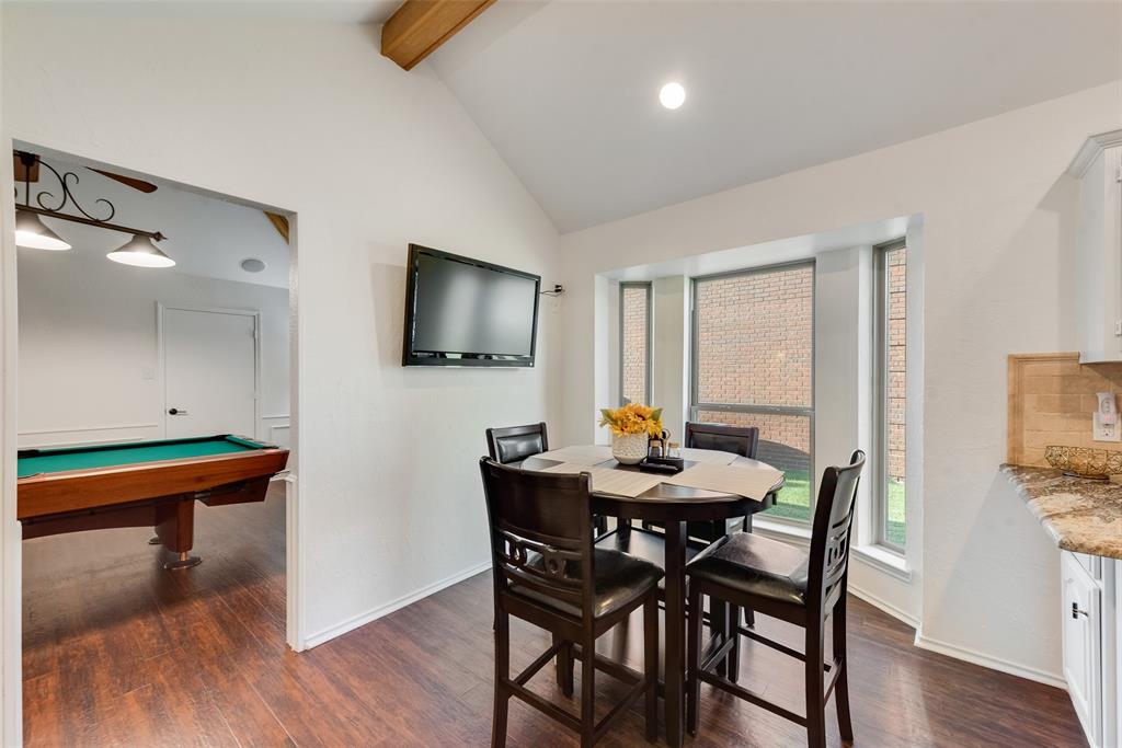 4027 Red Maple Drive Carrollton, TX 75007 - Photo 9 of 35 a view of a dining room with furniture and wooden floor
