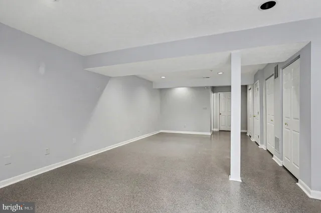 a view of swimming pool with seating area