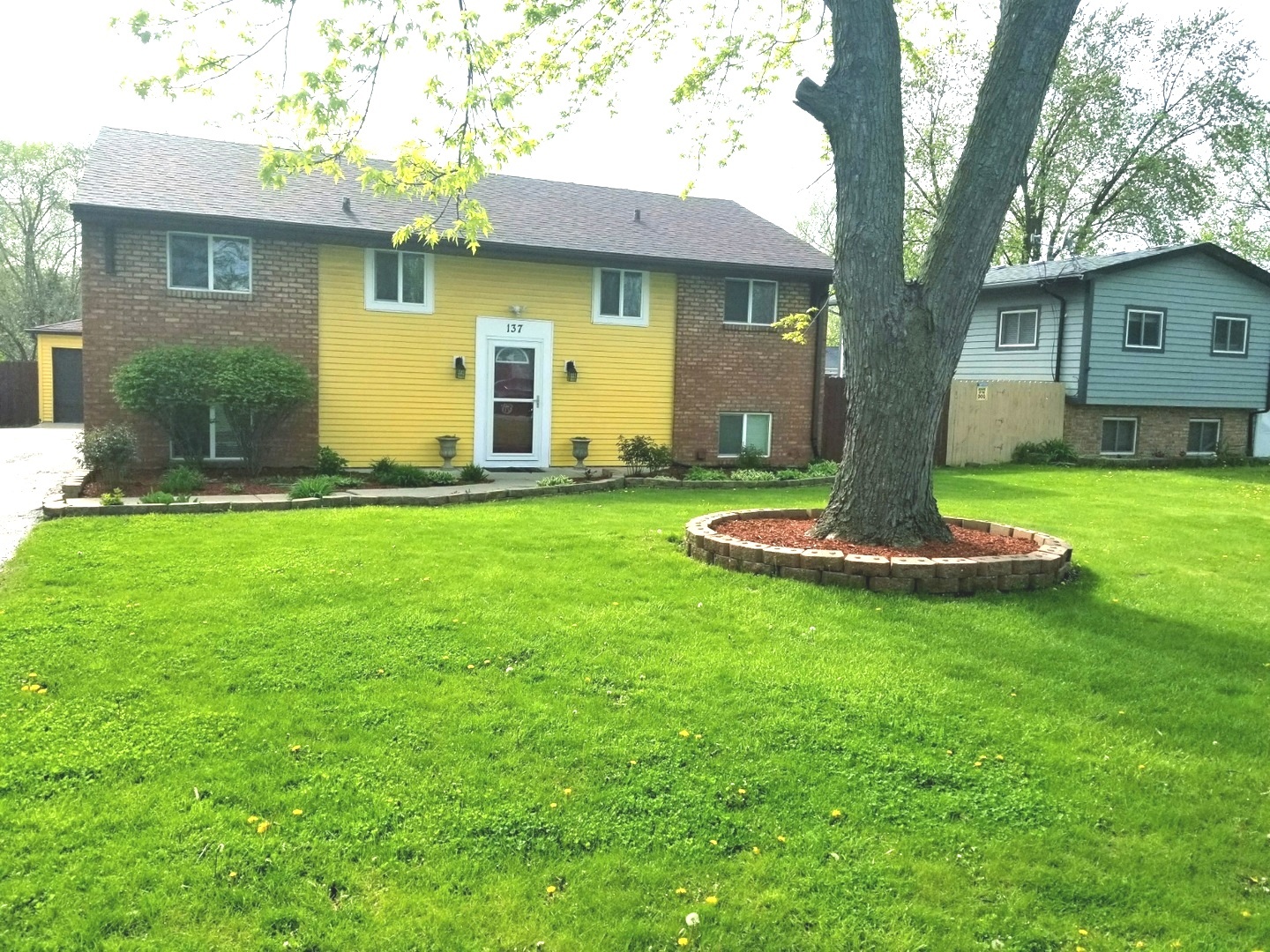 137 South Pinecrest Road Bolingbrook, IL 60440 - Photo 1 of 25 a house view with a garden space