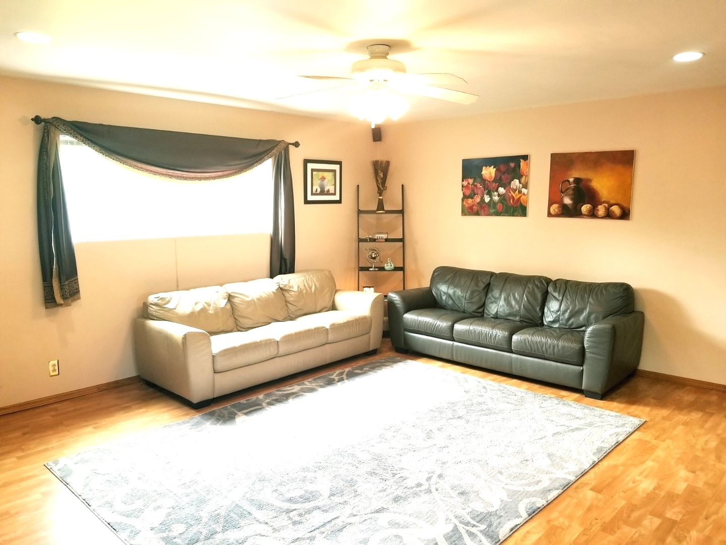 137 South Pinecrest Road Bolingbrook, IL 60440 - Photo 3 of 25 a living room with furniture and a large window