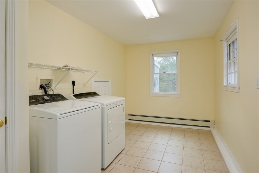 22 Granite Street Medway, MA 02053 - Photo 21 of 30 a utility room with dryer and washer