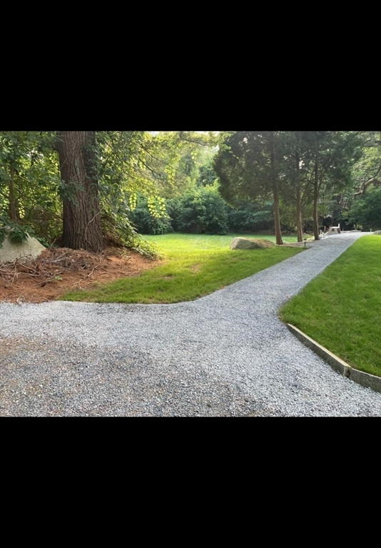 22 Granite Street Medway, MA 02053 - Photo 3 of 30 a view of a yard with an outdoor seating