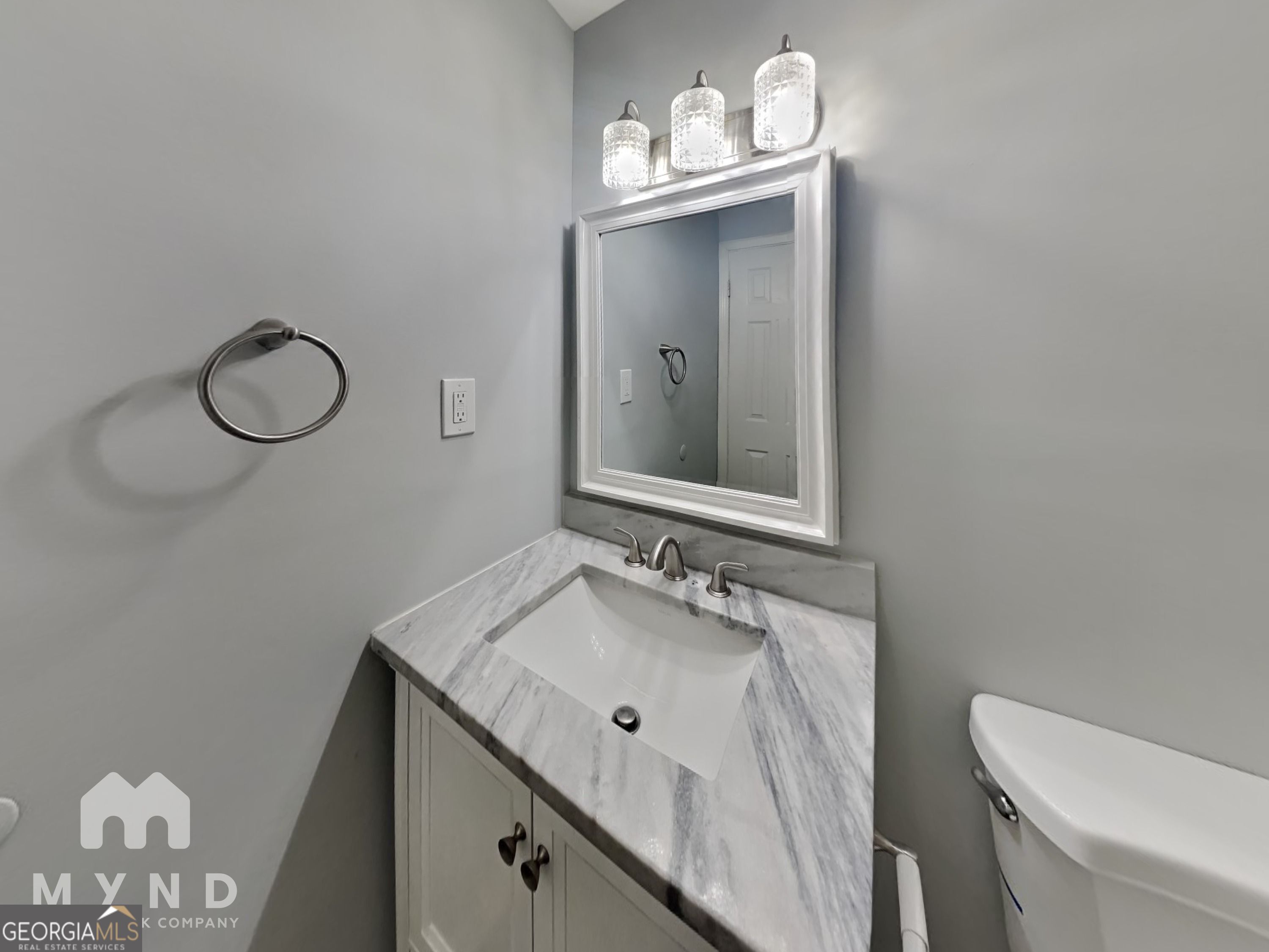 4202 Old Rock Cut Road Conley, GA 30288 - Photo 17 of 21 a bathroom with a sink vanity and a mirror