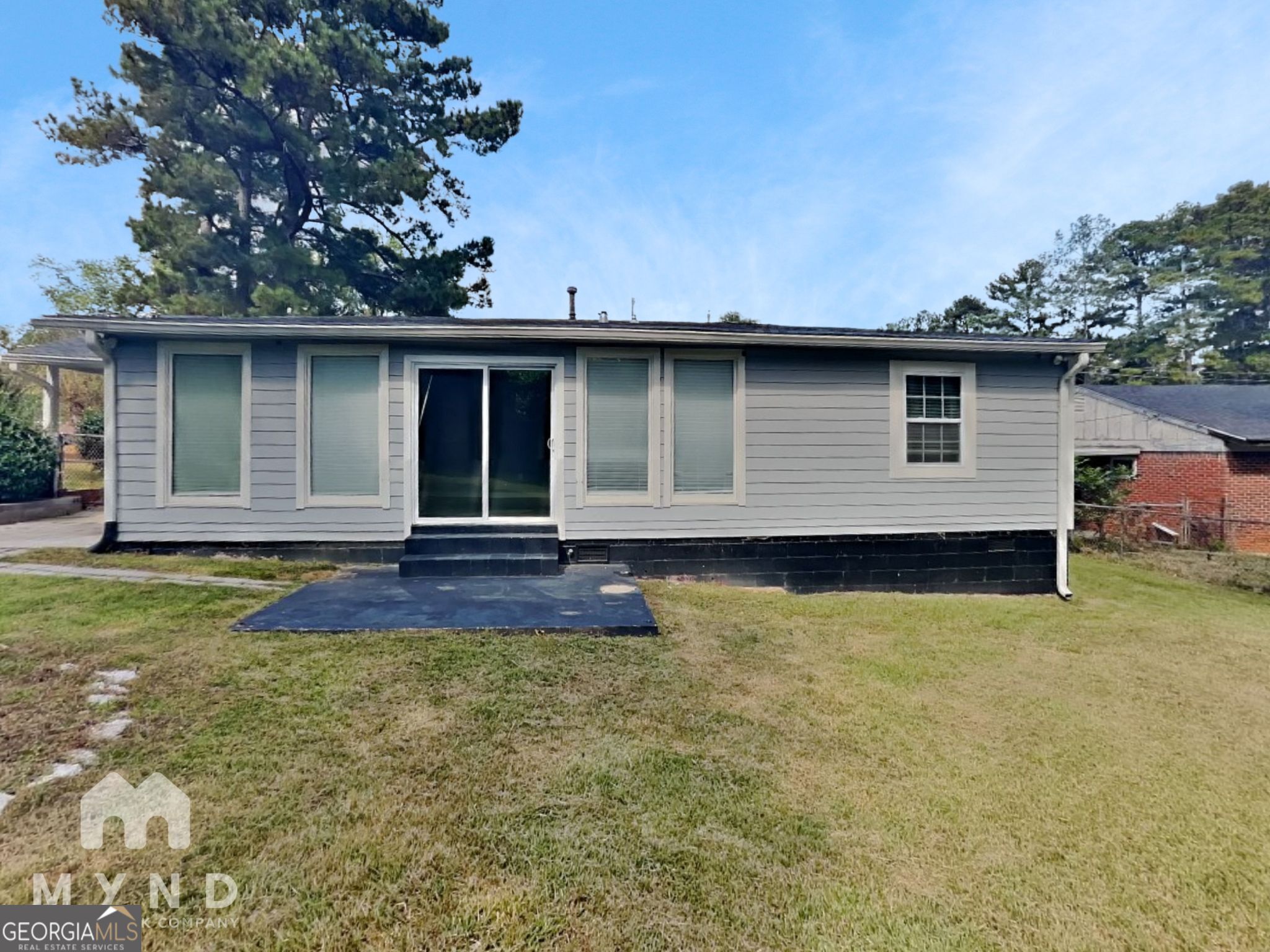 4202 Old Rock Cut Road Conley, GA 30288 - Photo 19 of 21 a front view of a house with a yard