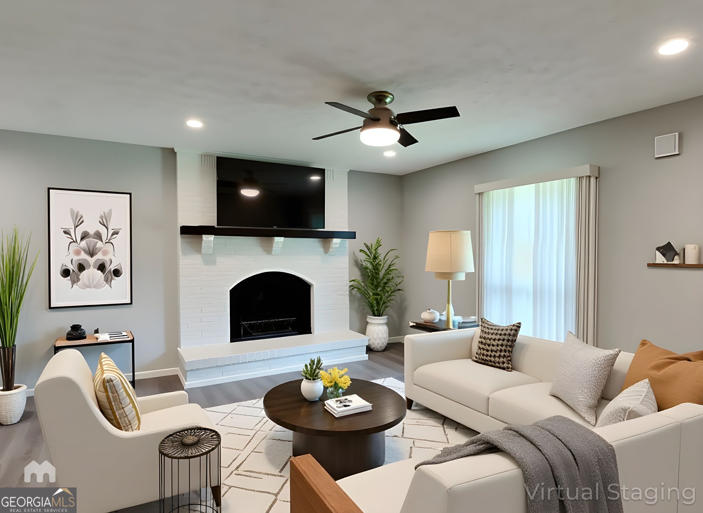 4202 Old Rock Cut Road Conley, GA 30288 - Photo 2 of 21 a living room with furniture a flat screen tv and a fireplace