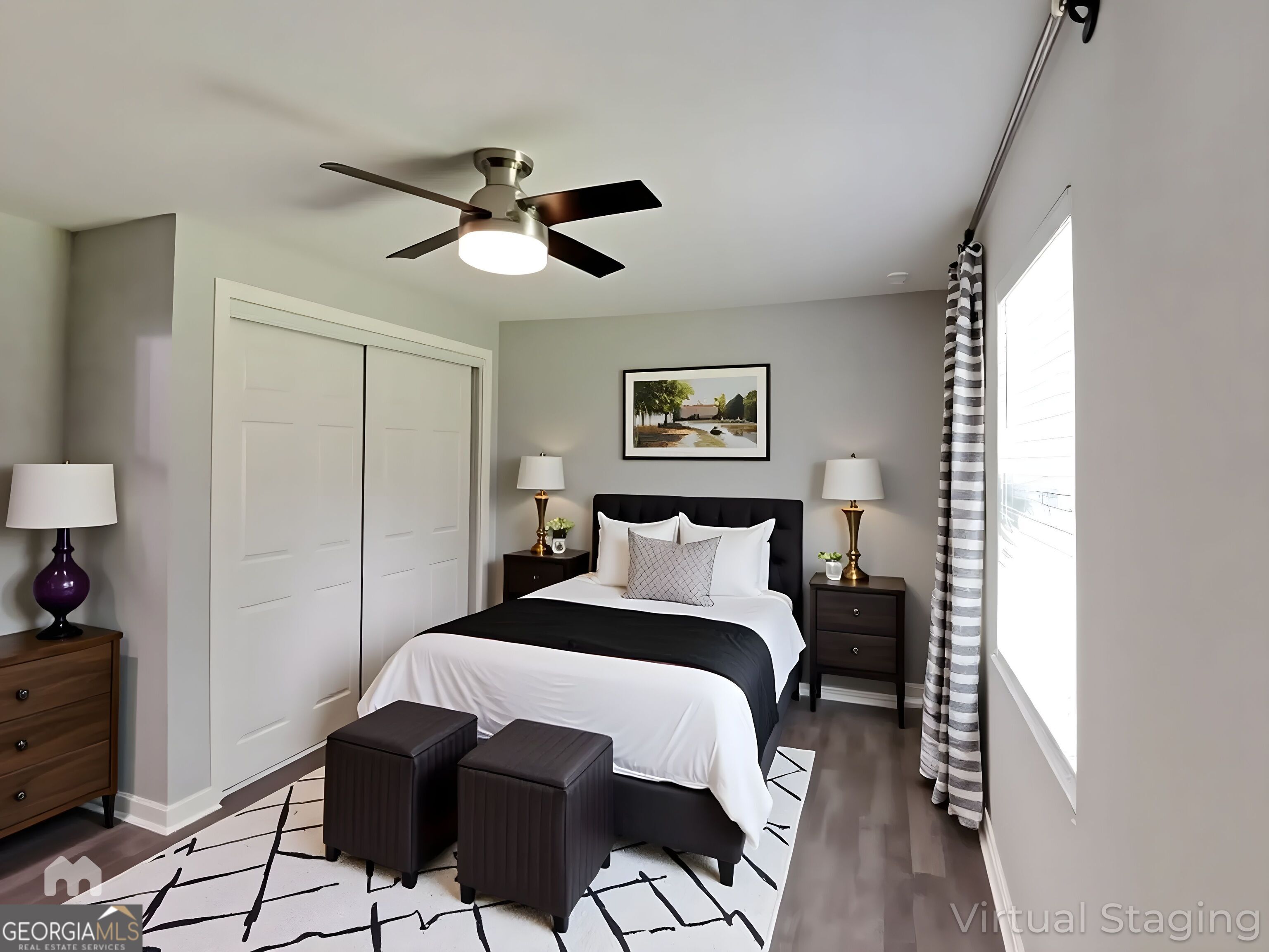 4202 Old Rock Cut Road Conley, GA 30288 - Photo 3 of 21 a bedroom with a bed and a chandelier