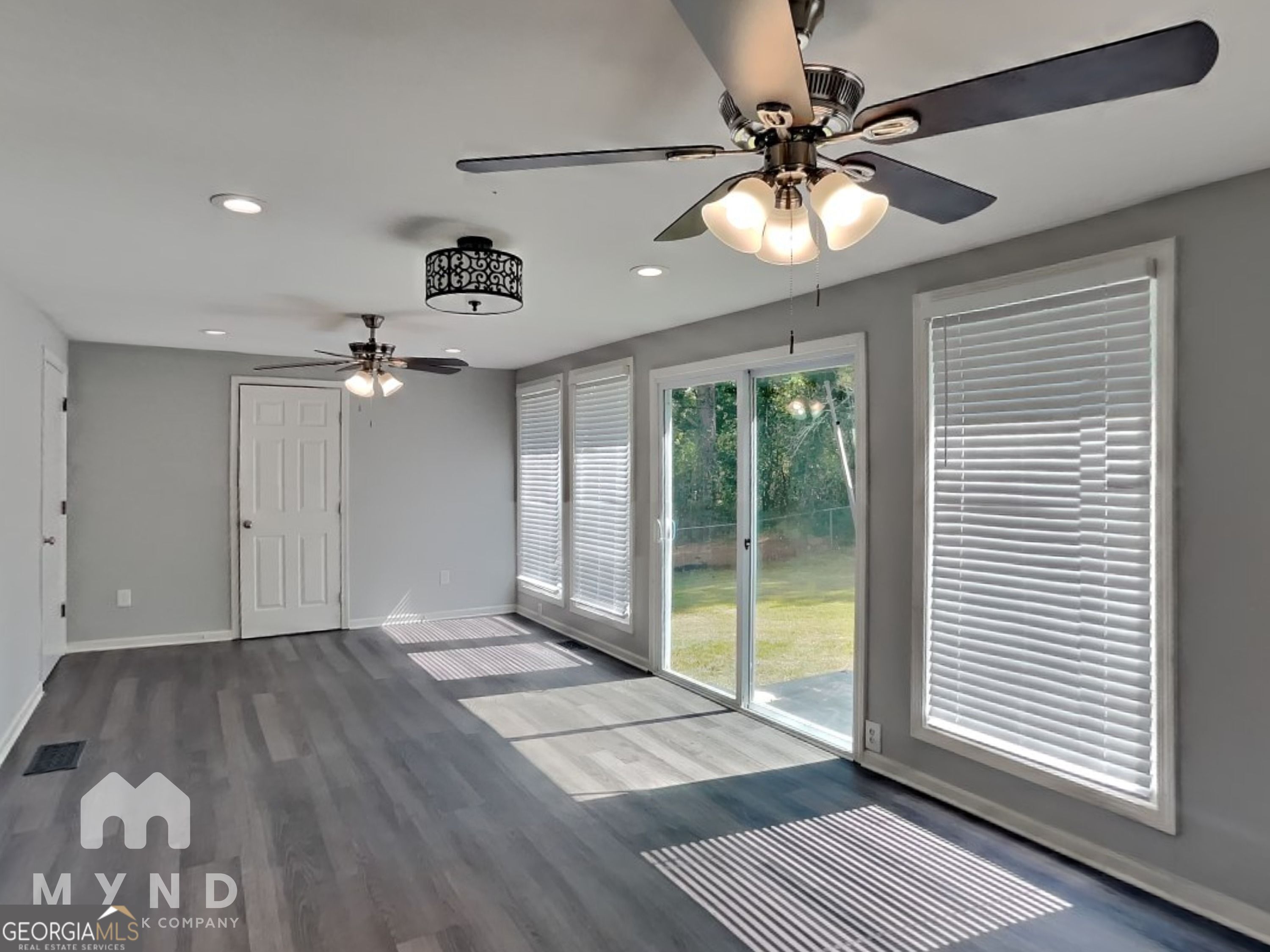 4202 Old Rock Cut Road Conley, GA 30288 - Photo 9 of 21 a view of an empty room with a window
