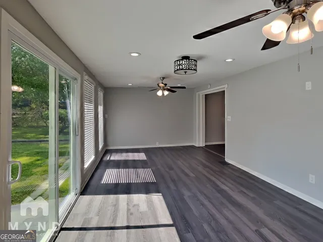 a view of entryway with wooden floor