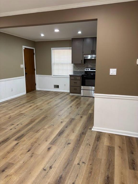 616 Fayetteville Road Jonesboro, GA 30236 - Photo 12 of 14 a view of kitchen with kitchen island microwave and stove
