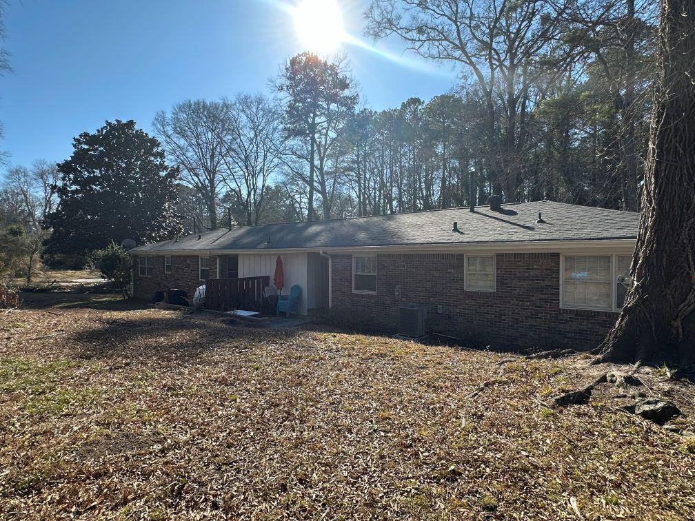 616 Fayetteville Road Jonesboro, GA 30236 - Photo 4 of 14 a view of a backyard of the house