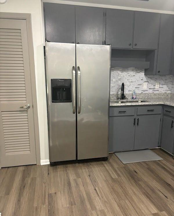 616 Fayetteville Road Jonesboro, GA 30236 - Photo 5 of 14 a kitchen with stainless steel appliances a refrigerator and a sink