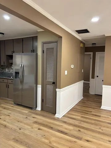 a view of a kitchen with a sink