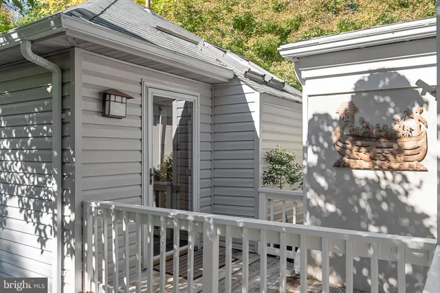 a view of a house with a tree