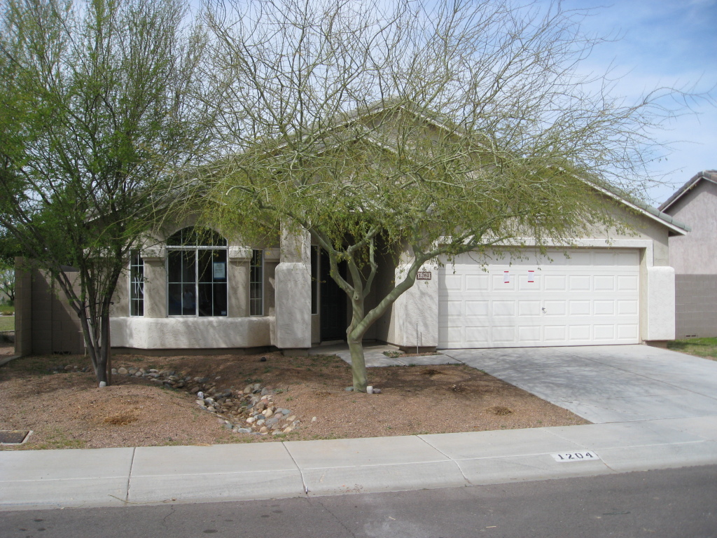 1204 Grenadine Road Phoenix, AZ 85040 - Photo 1 of 12 Front of Home