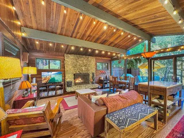 a outdoor space with patio lots of furniture and iron fence