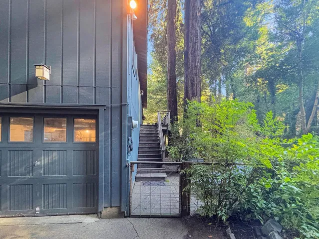 a view of a backyard with sitting area