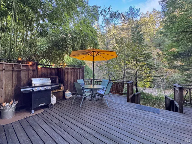 a view of a house with a tree