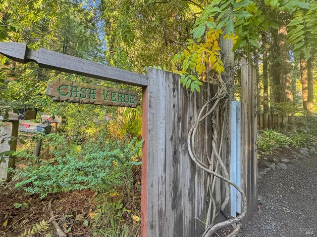 a view of outdoor space with wooden fence