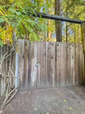 a view of a wooden fence