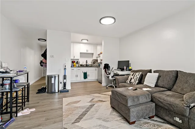 a kitchen with stainless steel appliances granite countertop a stove a microwave and cabinets