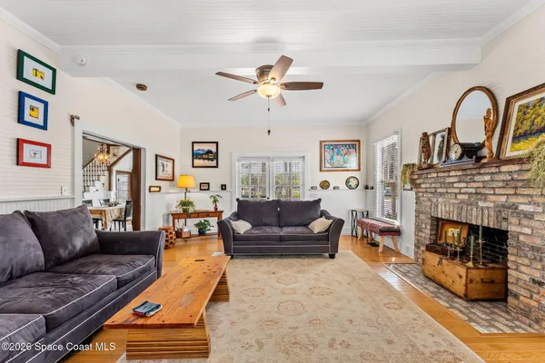 a view of a lake with chairs