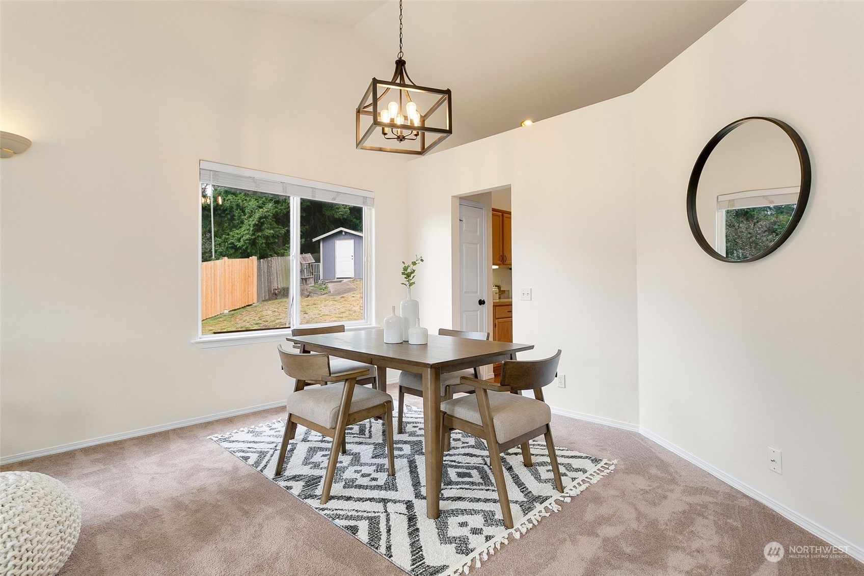 20530 Richmond Road Bothell, WA 98012 - Photo 8 of 33 a view of a dining room with furniture window and outside view