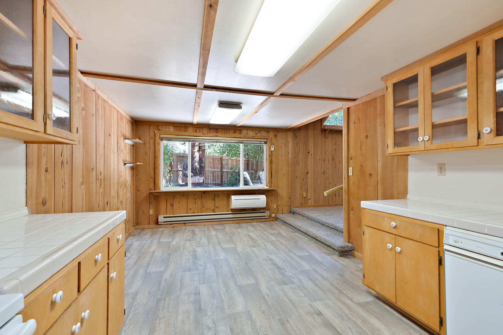 3990 Galice Road Merlin, OR 97532 - Photo 10 of 43 a view of an empty room with a window and wooden floor