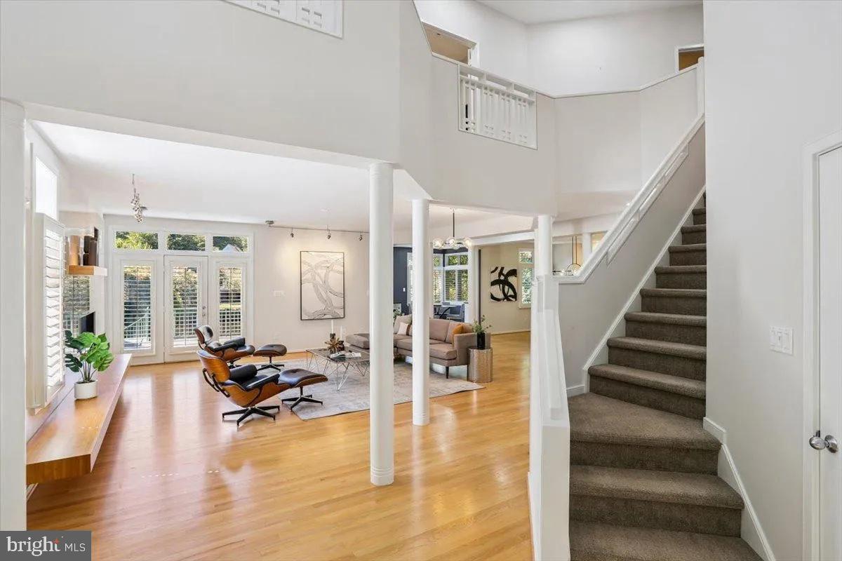 1460 Waterfront Road Reston, VA 20194 - Photo 11 of 59 a view of a livingroom with furniture wooden floor and a view of living room