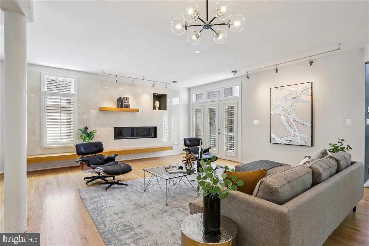 1460 Waterfront Road Reston, VA 20194 - Photo 13 of 59 a living room with furniture fireplace and a window