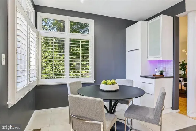 a kitchen with stainless steel appliances a sink a stove and a refrigerator