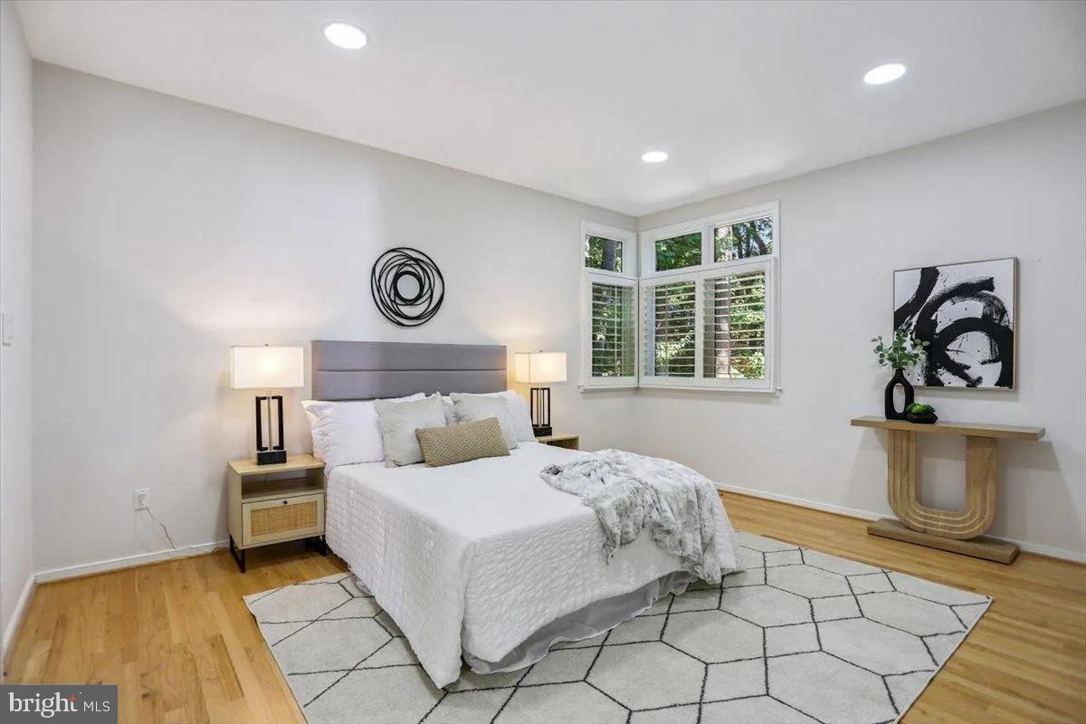 1460 Waterfront Road Reston, VA 20194 - Photo 24 of 59 a bedroom with a bed and a window