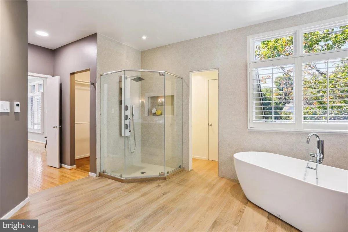 1460 Waterfront Road Reston, VA 20194 - Photo 31 of 59 a bathroom with a bathtub and a shower