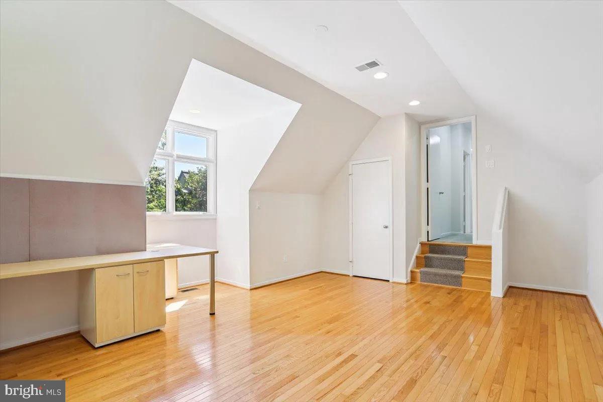 1460 Waterfront Road Reston, VA 20194 - Photo 37 of 59 a view of empty room with wooden floor