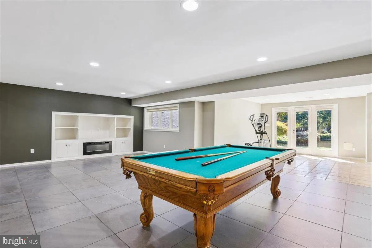 1460 Waterfront Road Reston, VA 20194 - Photo 43 of 59 a room with pool table and windows