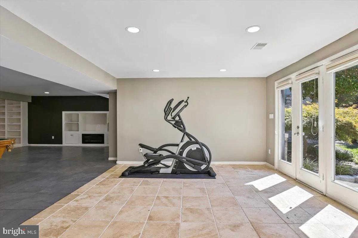 1460 Waterfront Road Reston, VA 20194 - Photo 46 of 59 a view of a room with gym equipment