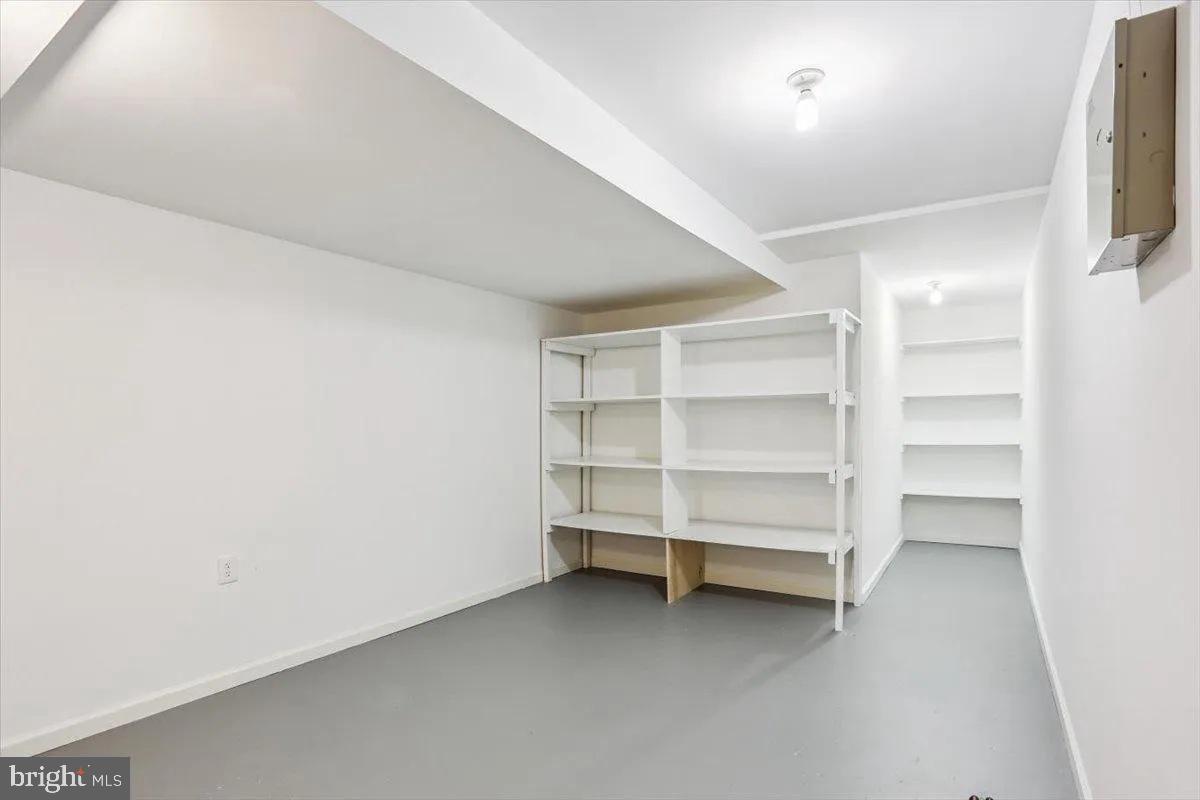 1460 Waterfront Road Reston, VA 20194 - Photo 49 of 59 a view of room with shelf