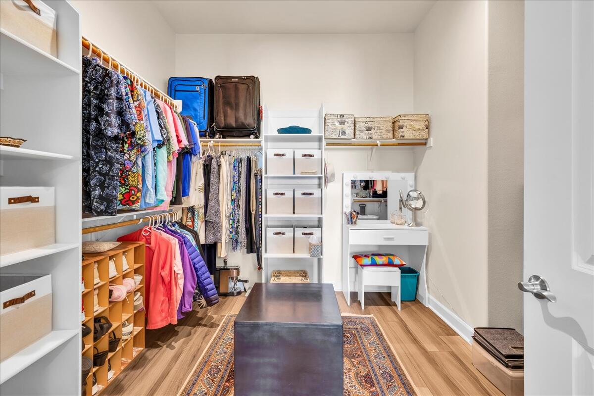 97 Zinfandel Rancho Mirage, CA 92270 - Photo 26 of 68 a view of walk in closet with clothes and shoes