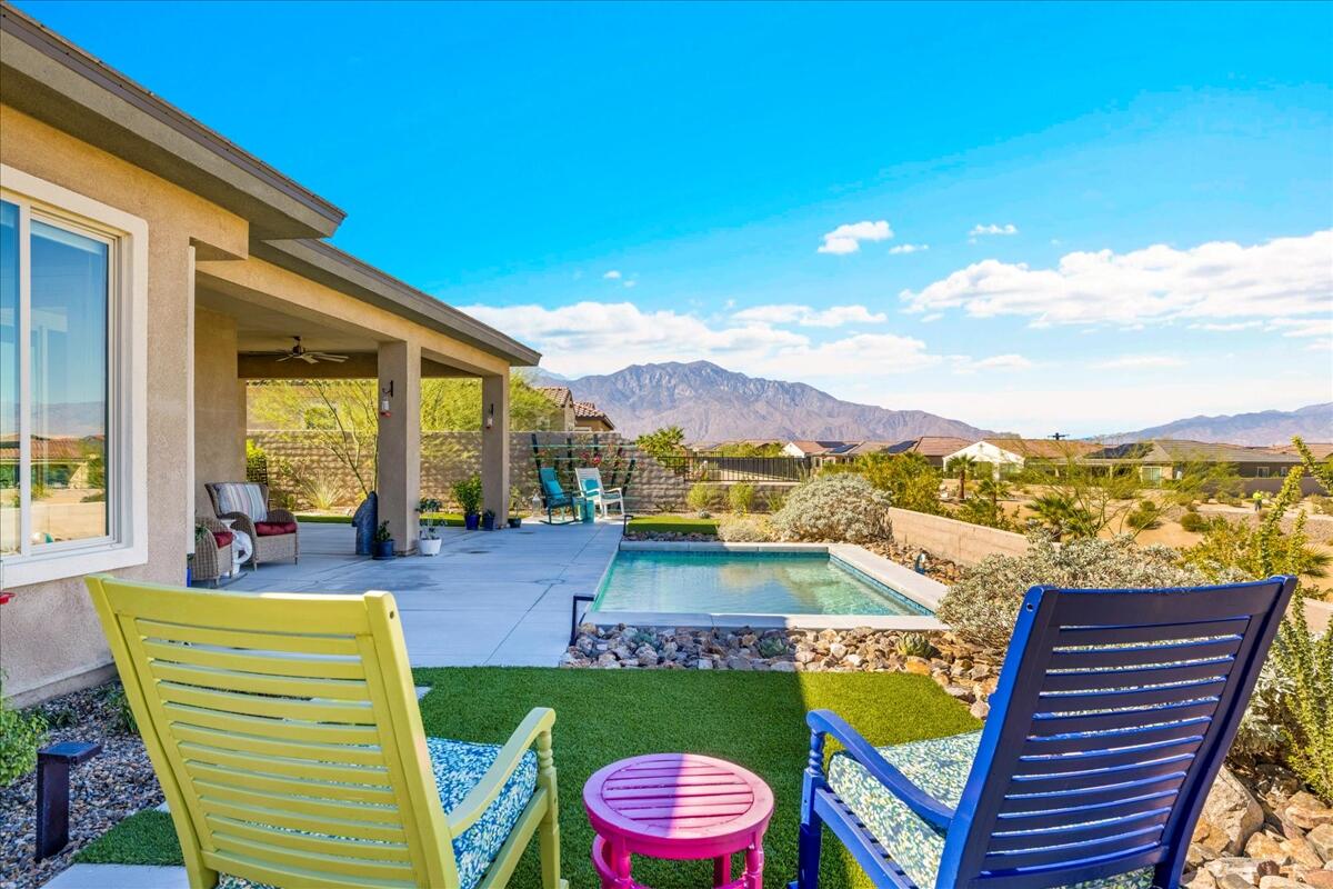 97 Zinfandel Rancho Mirage, CA 92270 - Photo 29 of 50 a view of a patio with swimming pool and a chairs