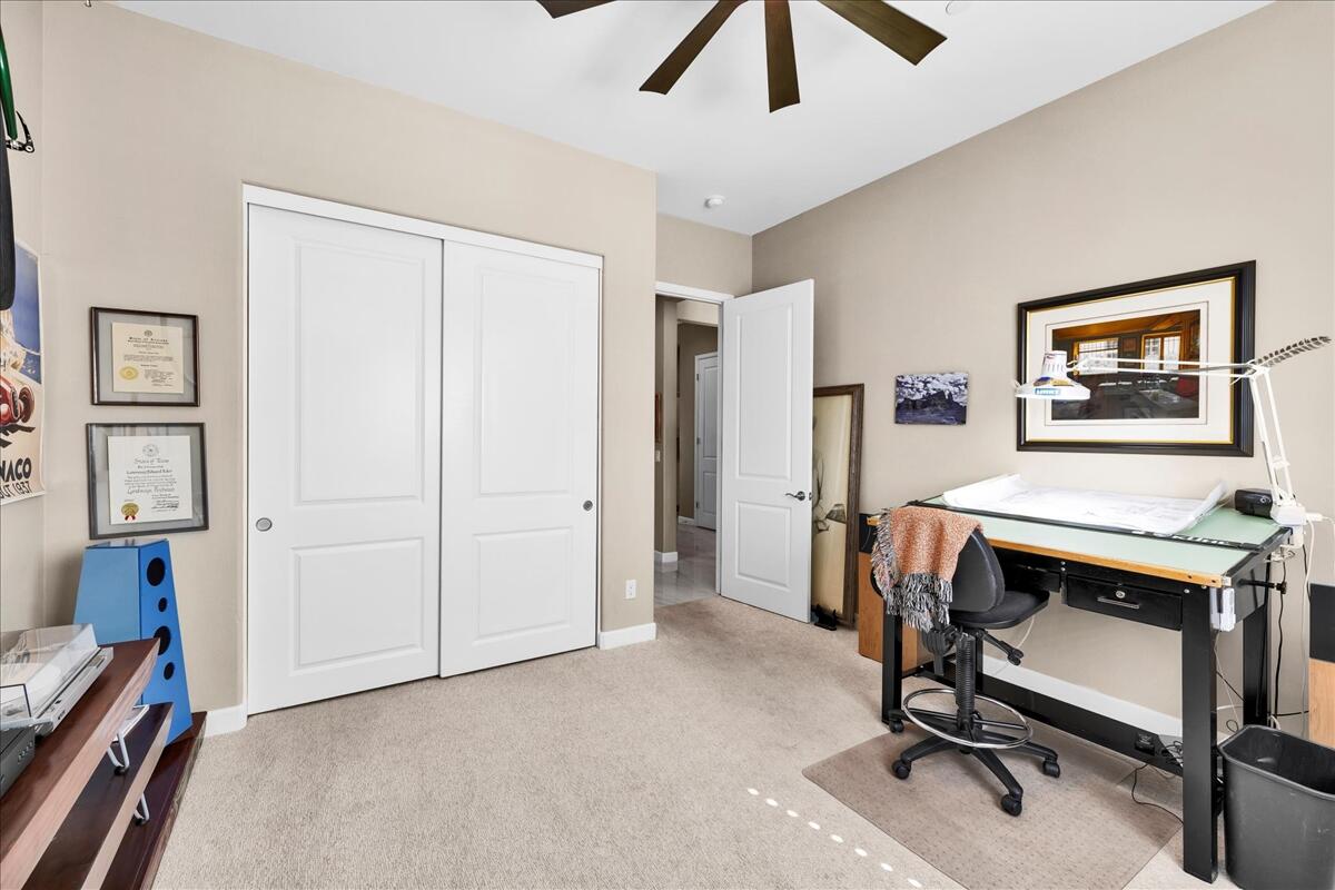 97 Zinfandel Rancho Mirage, CA 92270 - Photo 30 of 68 a view of a workspace with furniture and a window