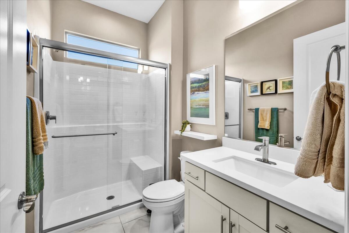 97 Zinfandel Rancho Mirage, CA 92270 - Photo 31 of 68 a bathroom with a sink a toilet and shower