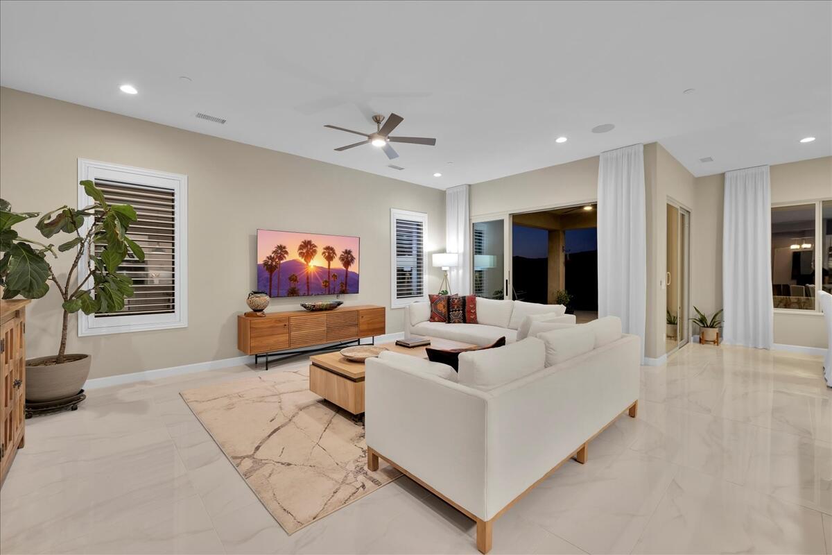 97 Zinfandel Rancho Mirage, CA 92270 - Photo 10 of 68 a living room with furniture and a flat screen tv