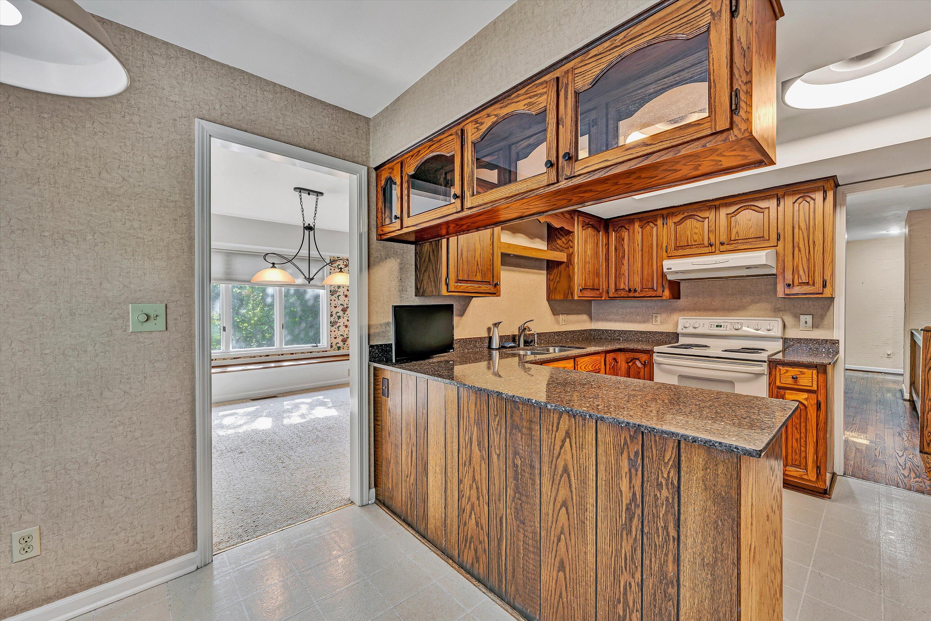 3318 One Oak Road Roanoke, VA 24018 - Photo 18 of 43 a view of a kitchen with a large window