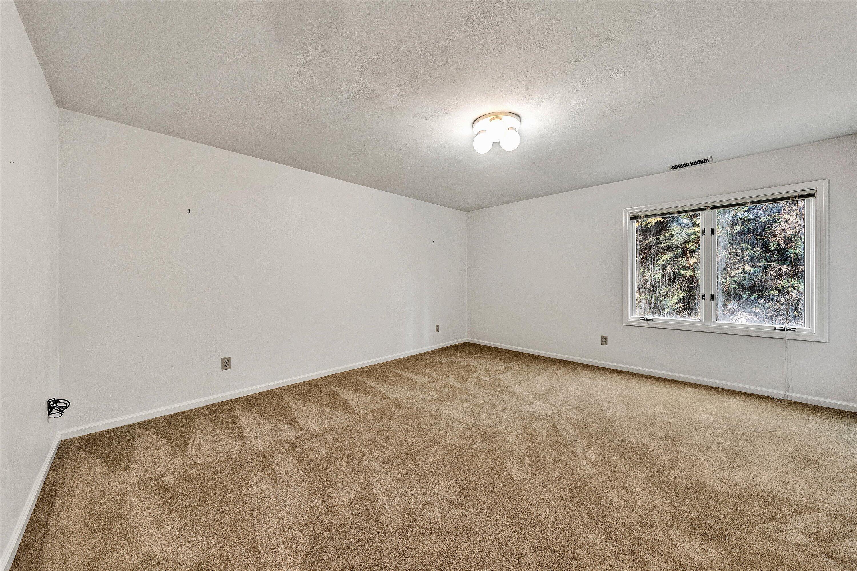 3318 One Oak Road Roanoke, VA 24018 - Photo 35 of 43 a view of an empty room with a window