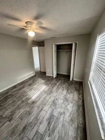 a view of an empty room and window