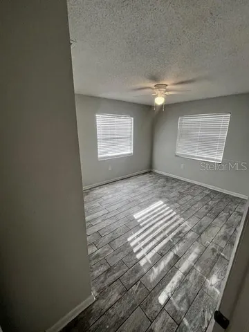 an empty room with windows